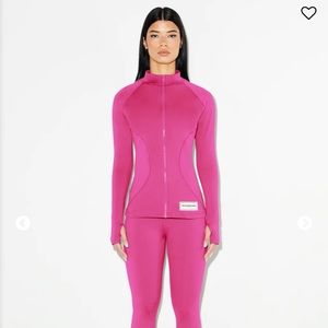 The giving movement hot pink jacket and flare leggings matching activewear set